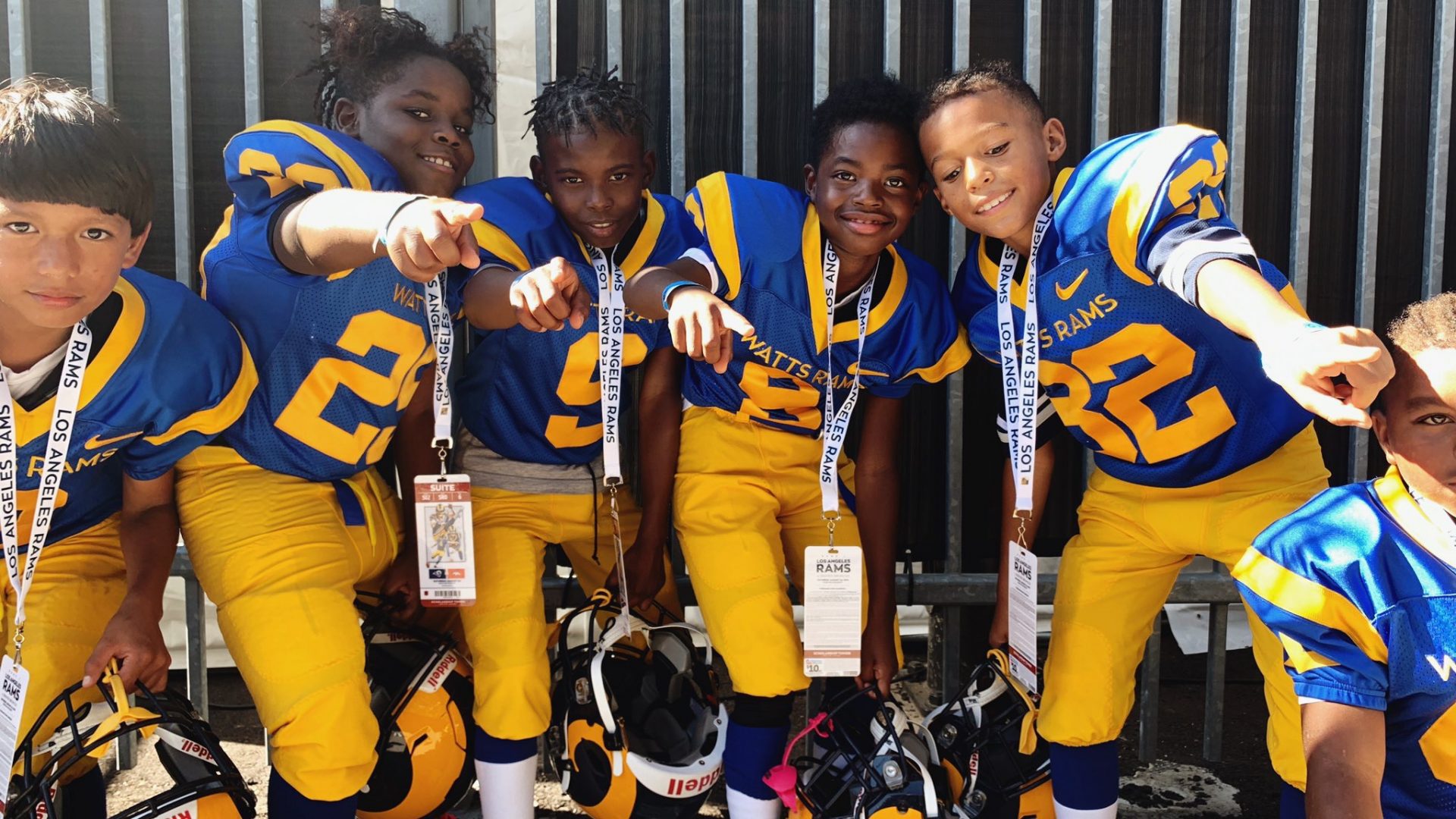 A group of young people in football uniforms.